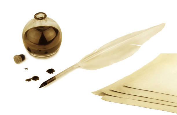 istock Quill pen, papers and ink bottle with ink blots 843237982