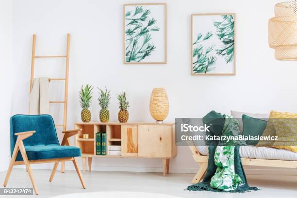 Cozy Room With Pineapples Stock Photo - Download Image Now - Apartment, Armchair, Beige
