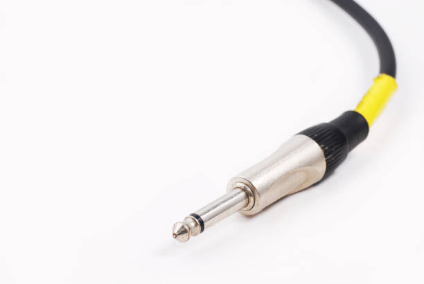 istock guitar cable audio jack on isolated white background 843245766