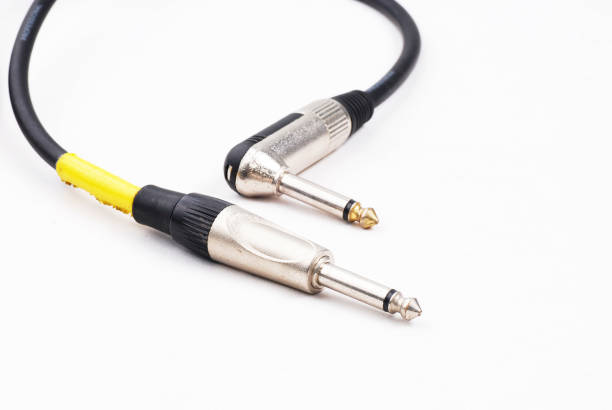 istock guitar cable audio jack on isolated white background 843245828