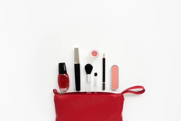 red cosmetic bag with accessories makeup cosmetics in a small red beautician make up bag stock pictures, royalty-free photos & images