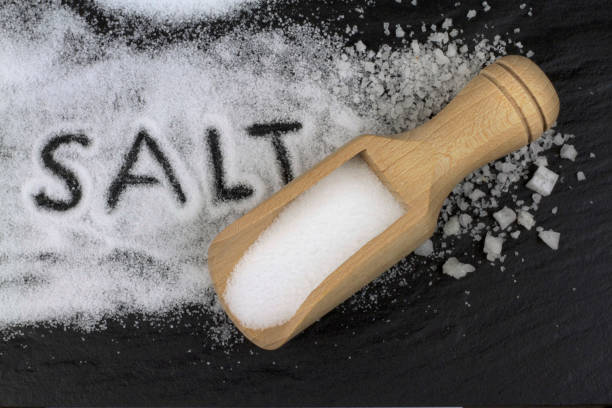 istock Salt and wooden spoon 843253092