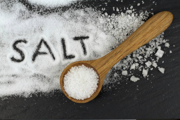 istock Salt and wooden spoon 843253112