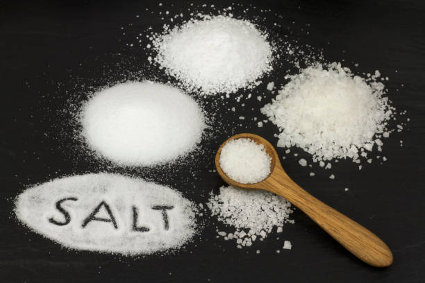 istock Salt and wooden spoon 843253318