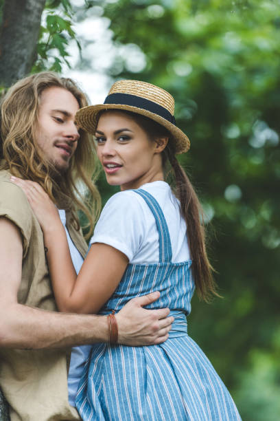 istock young couple in park 843253416
