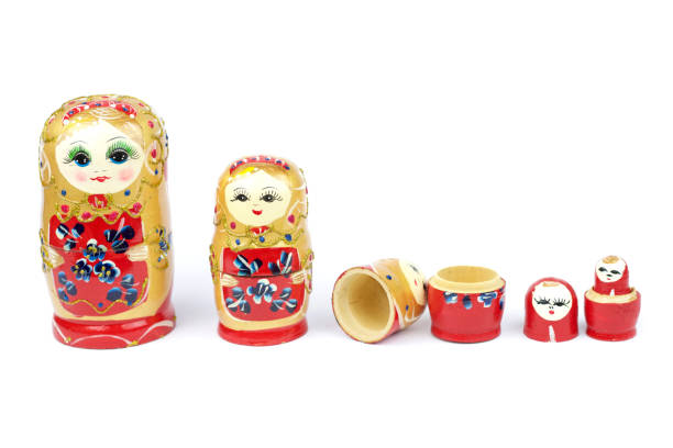 Russian Traditional Dolls Matrioshka - Matryoshka or Babushka Russian Traditional Dolls Matrioshka - Matryoshka or Babushka on white background babuska stock pictures, royalty-free photos & images