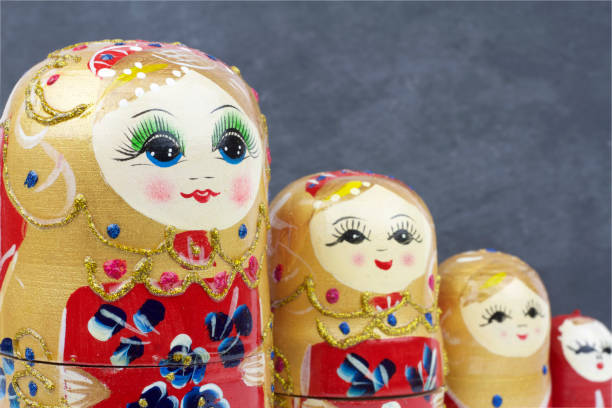 Russian Traditional Dolls Matrioshka - Matryoshka or Babushka Russian Traditional Dolls Matrioshka - Matryoshka or Babushka close up image babuska stock pictures, royalty-free photos & images