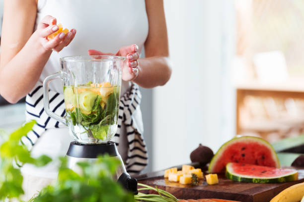 istock Woman preparing energetic smoothie 843258544