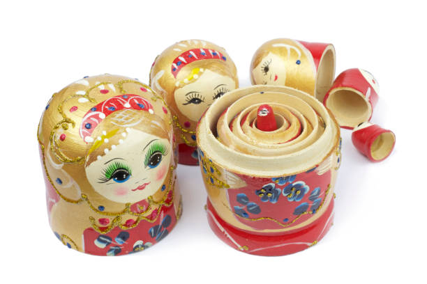 Russian Traditional Dolls Matrioshka - Matryoshka or Babushka Russian Traditional Dolls Matrioshka - Matryoshka or Babushka on white background babuska stock pictures, royalty-free photos & images