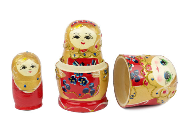 Russian Traditional Dolls Matrioshka - Matryoshka or Babushka Russian Traditional Dolls Matrioshka - Matryoshka or Babushka on white background babuska stock pictures, royalty-free photos & images