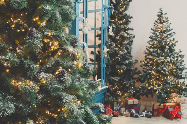 istock Decorated christmas trees in shiny garland background 843260022