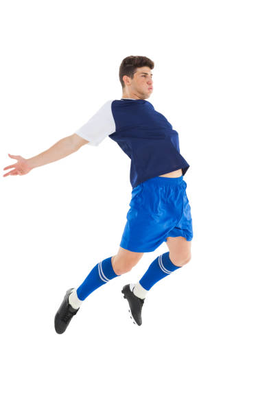 istock Football player in blue jersey jumping 843260862