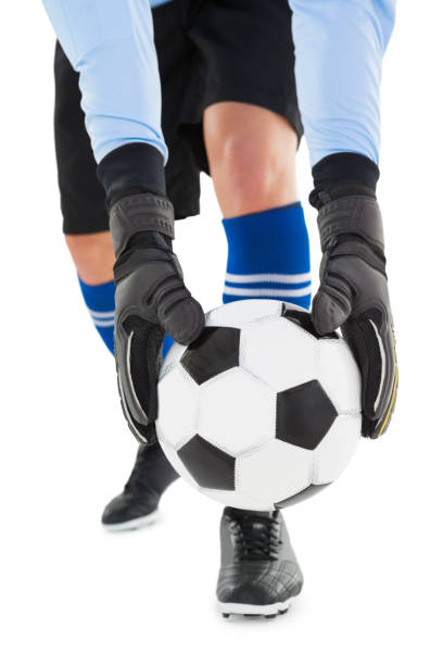 istock Goalkeeper picking up the ball 843260910