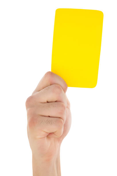 istock Hand holding yellow card up 843261426