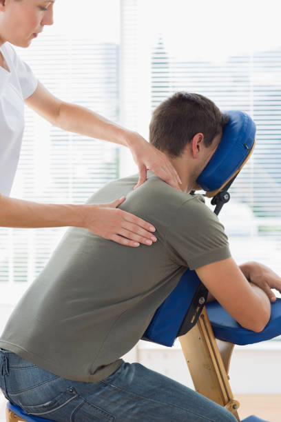istock Therapist massaging in hospital 843269576
