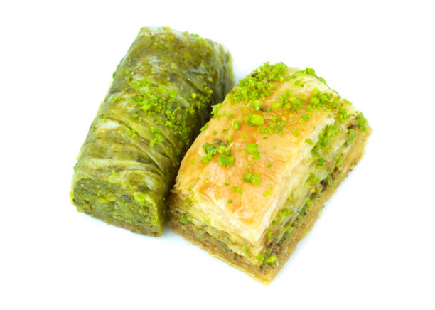 istock Delicious Turkish baklava and sarma with green pistachio nuts. 843270030