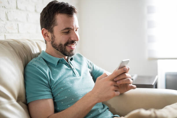istock Texting with friends and laughing 843271042
