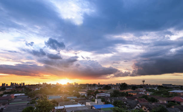 istock Sunset with cloudy sky over the city 843276938