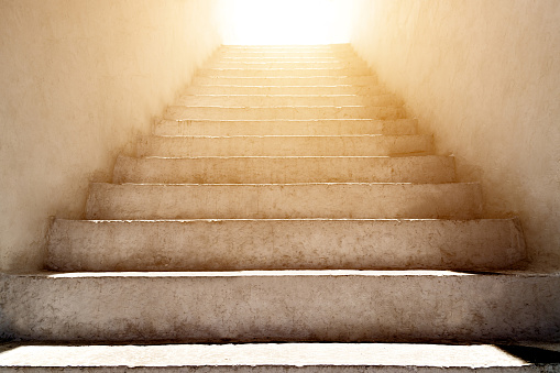 stairs leading up to the sunlight