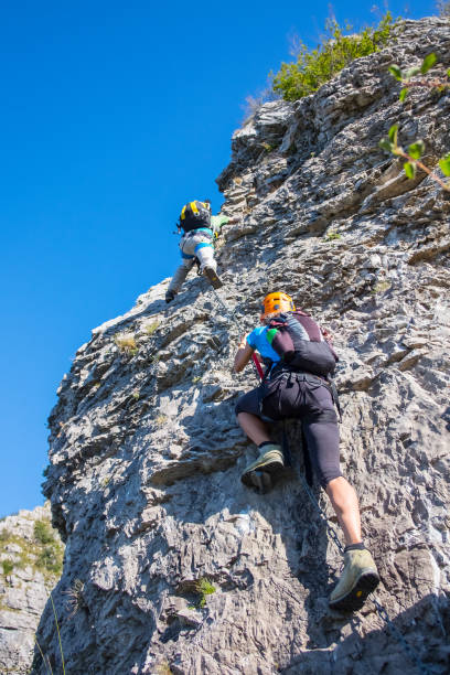 istock Mountaineers on equipped rockface 843280744