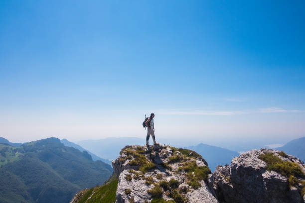 istock Hiker woman trekking on the high mountain path 843280756