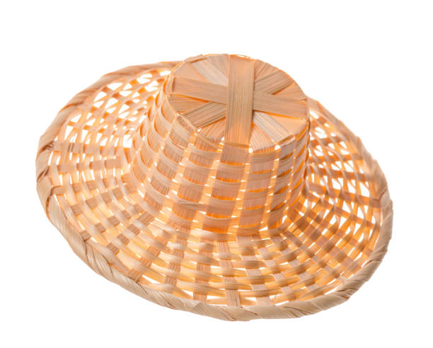 istock straw hat isolated on white background, close up 843281020