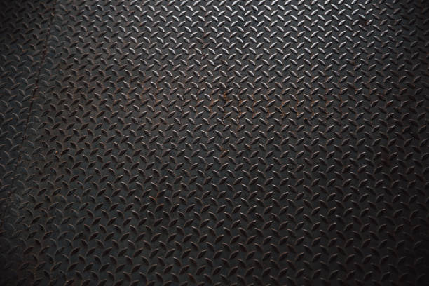 istock shiny old grunge metal steel pavement plate pattern from a manhole cover 843289322
