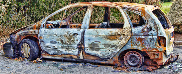 istock Absolutely burnt-out wreck of a car 843289518