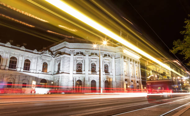 Burgtheater in Vienna Austia at night Famous Burgtheater in Vienna Austia at night burgtheater vienna stock pictures, royalty-free photos & images