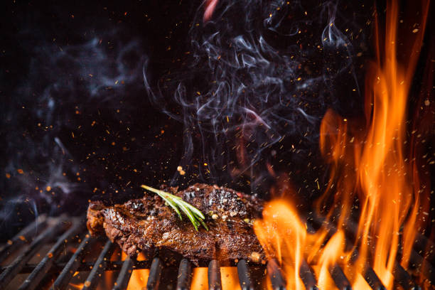 istock Beef steaks on the grill with flames 843289696
