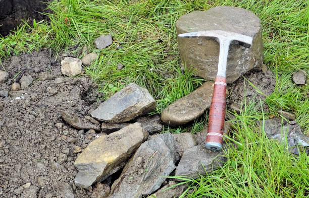 istock Hammer for a geologist, drill cuttings and a drill core 843290444