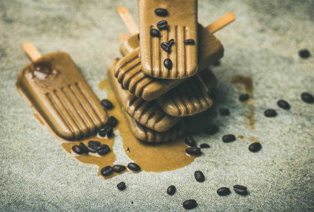 istock Flatlay of melting coffee latte popsicles with beans 843293046
