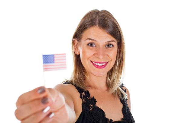 istock Woman holding USA flag 843296844