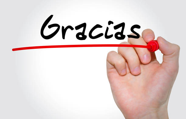 istock Hand writing inscription Gracias with marker, concept 843297070