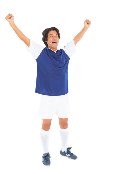 istock Football player in blue celebrating 843297160