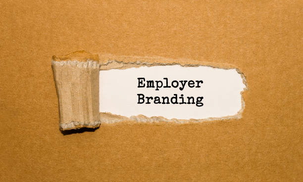 istock The text Employer Branding appearing behind torn brown paper 843297330