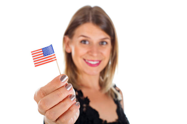 istock Woman holding USA flag 843298046