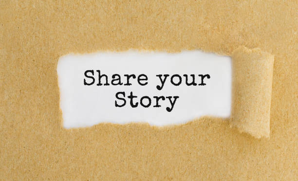 istock Text Share your story appearing behind ripped brown paper 843300874