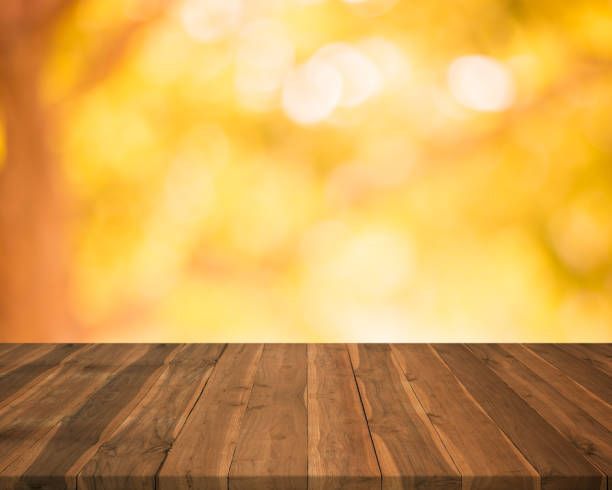 istock Empty wood table top on blurred abstract autumn background,Free space for editing products. 843301000