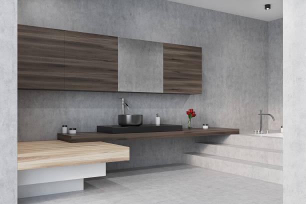 istock Concrete bathroom, tub and sink 843301022