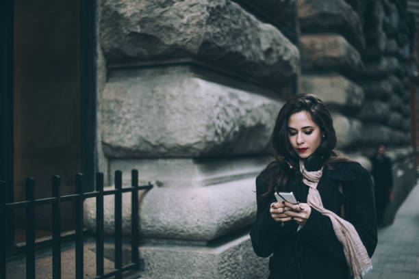 istock Girl listening music downtown 843301260