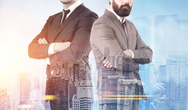 istock Two confident businessmen in a morning city 843302024