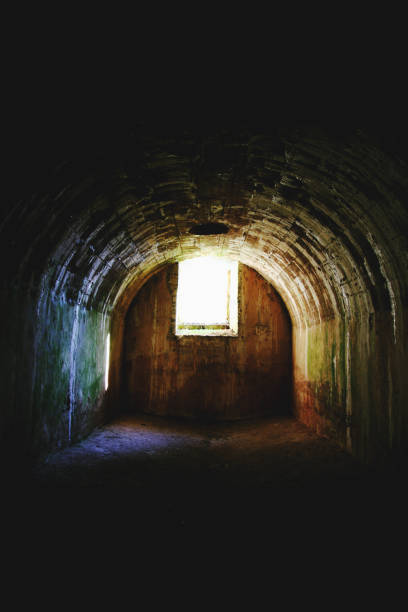 istock light at the end of the dark tunnel 843306182