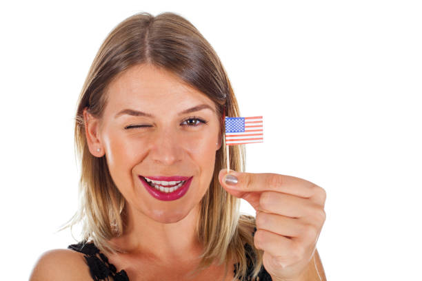 istock Woman holding USA flag 843306300