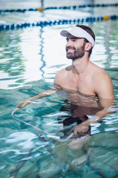 istock Smiling man doing underwater bike 843306424