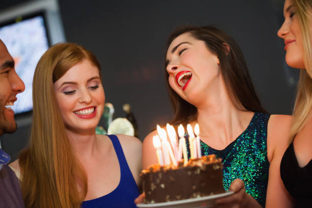 istock Cheerful friends celebrating birthday together 843306498