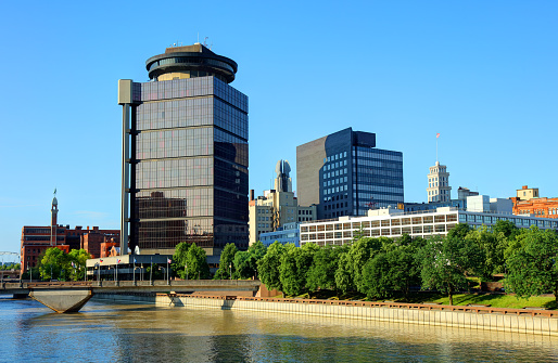 Rochester skyline along the Genesee River. Rochester is a city on the southern shore of Lake Ontario in the western portion of the U.S. state of New York, and the seat of Monroe County.
