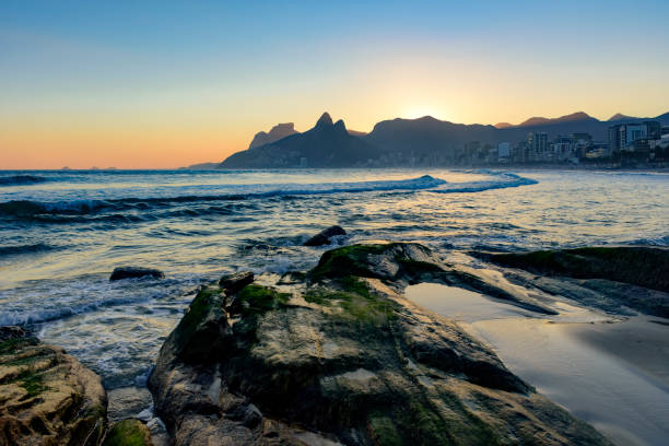 istock Sunset and stones at Ipanema beach 843308636