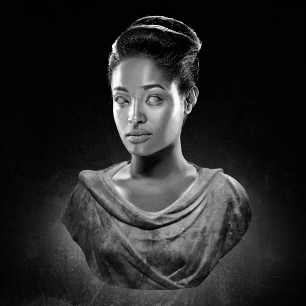 istock Black and white studio shot bust of beautiful female model posing as ancient Greek Goddess 843314332