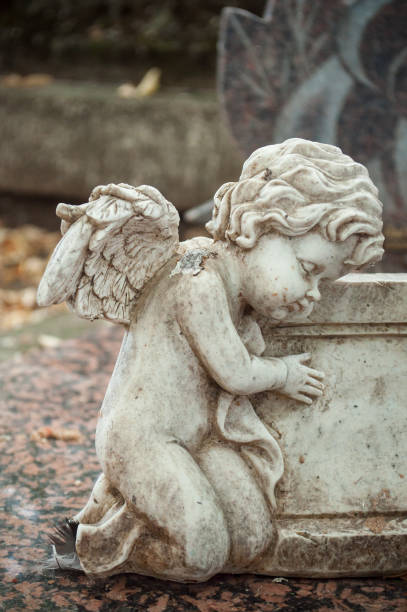 istock stoned angel in cemetery 843314460